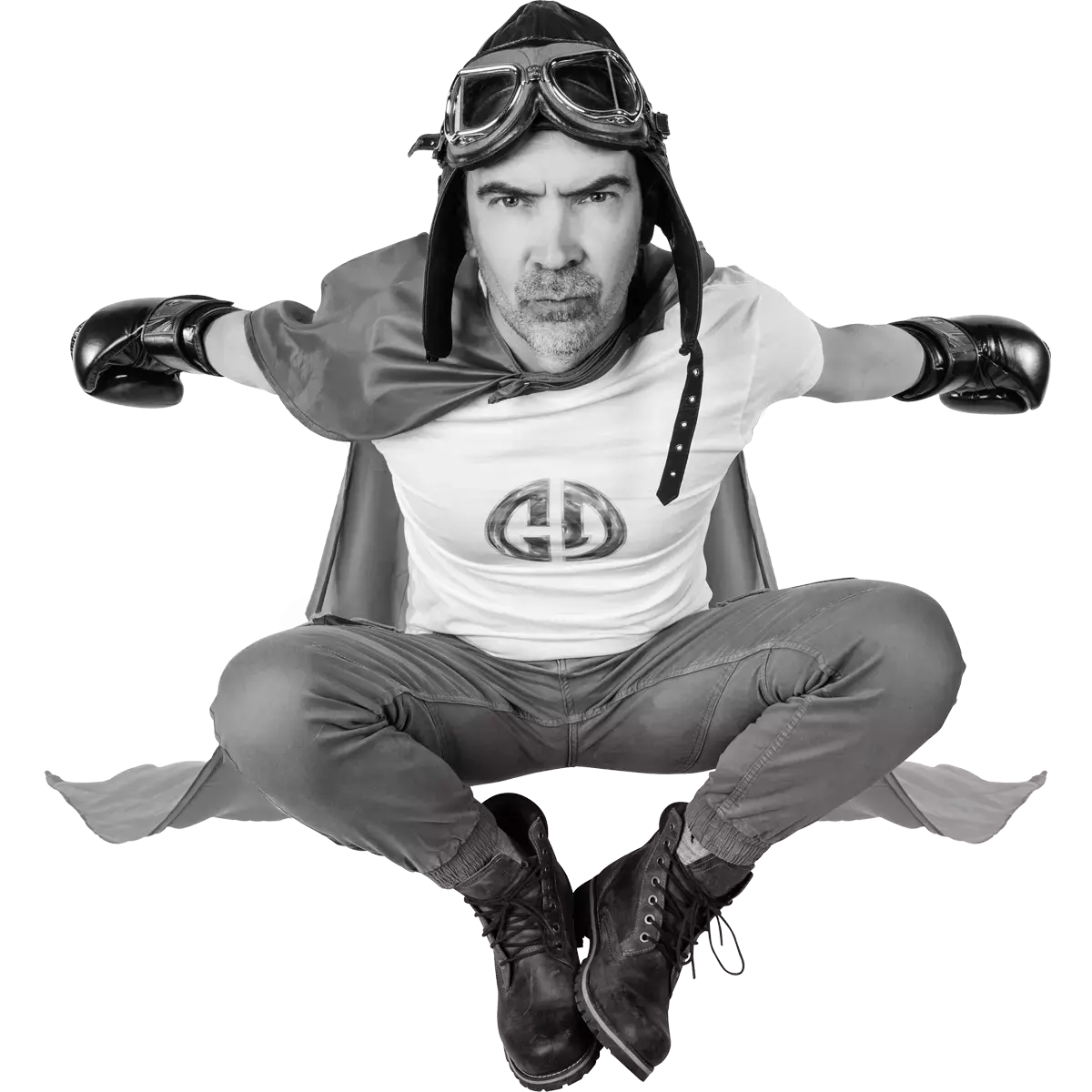 Dimitri déguisé en super-héros de la communication en train de sauter en l'air.